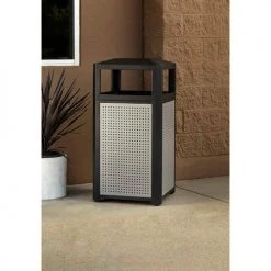 Safco® Outdoor Perforated Steel Side Opening Trash Can, 15 Gallon, Black 8 Safco® Outdoor Perforated Steel Side Opening Trash Can, 15 Gallon, Black -Cheap Trash & Recycling Store 9934BL Lifestyle AngleImageFull 1
